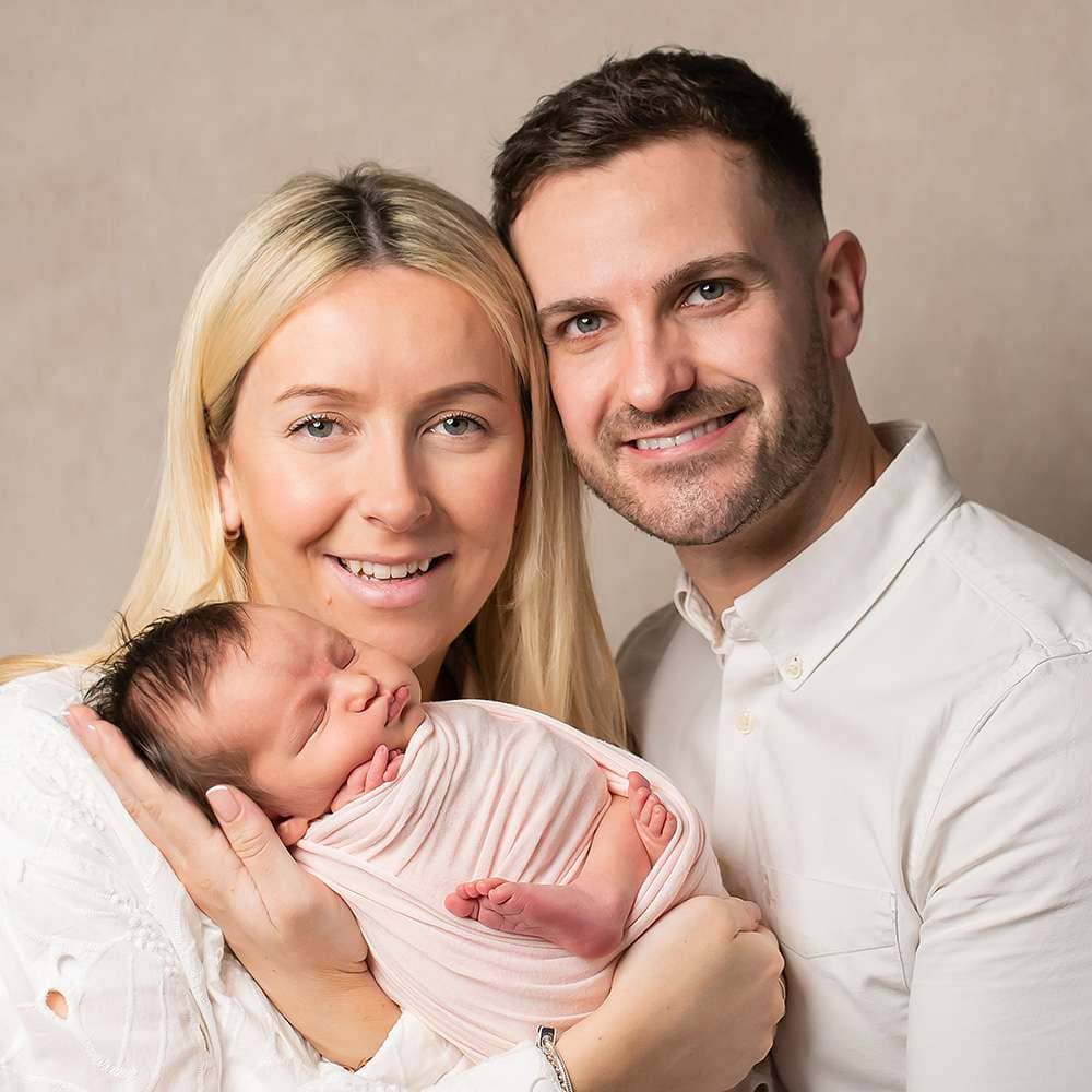 Family portrait during newborn photoshoot in Burgess Hill