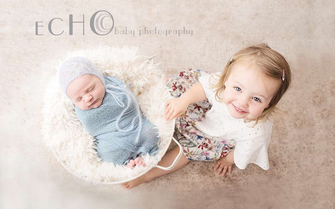 Do you photograph the baby with siblings? Definitely!