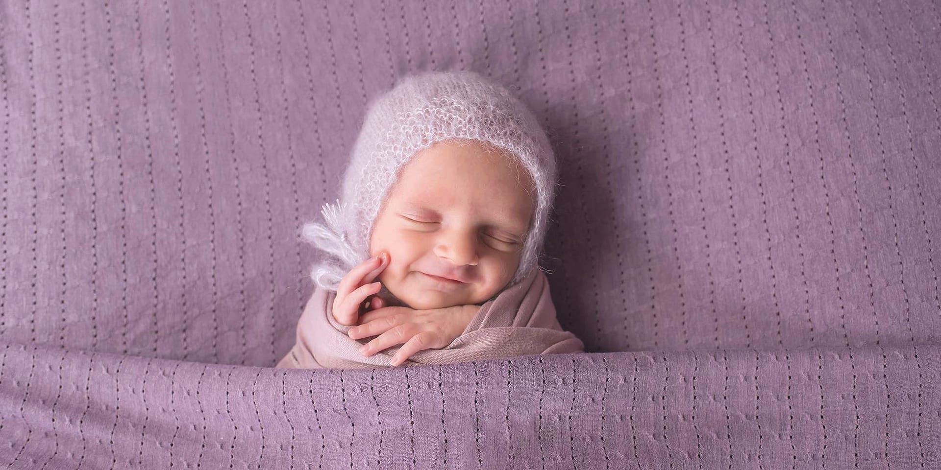 Smiling baby girl during  photography session west sussex